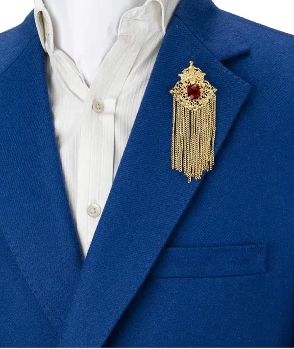 Voxon_Crowned_Deep_Red_Stone_with_Abstract_Work_and_Hanging_Chain_Brooch