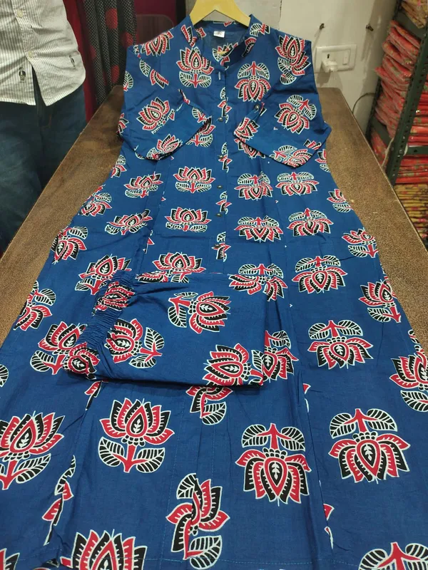 Blue_Suit_Rayon_Kurta_And_Pant_Co-Ord_Set_With_Floral_Printed_Mandarin_Collar_Neck_Down_Button_Half_Sleeve_A_Line_Calf_Length_Side_Pocket_For_Women
