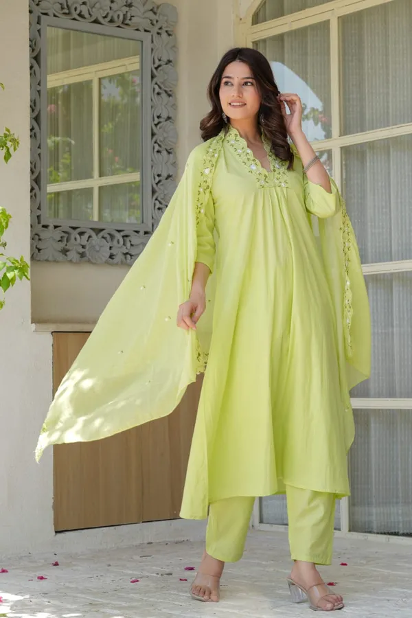 Green_beautiful_embroidery_with_suqes_Heavy__Suit_which_is_beautifully_decorated__It_is_paired_with_matching_pants