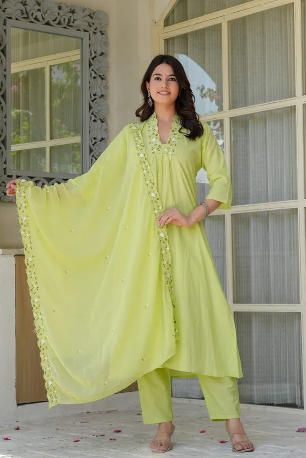 Green_beautiful_embroidery_with_suqes_Heavy__Suit_which_is_beautifully_decorated__It_is_paired_with_matching_pants