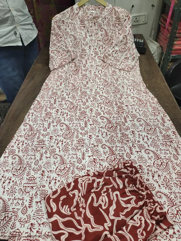 Warli_printed_A_line_buttoned_kurta_with_pocket_on_side_with_wide_palazzos