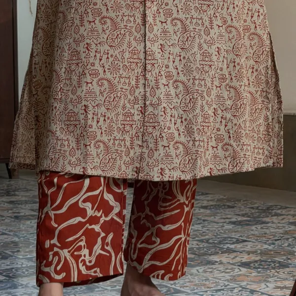 Warli_printed_A_line_buttoned_kurta_with_pocket_on_side_with_wide_palazzos