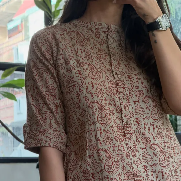 Warli_printed_A_line_buttoned_kurta_with_pocket_on_side_with_wide_palazzos