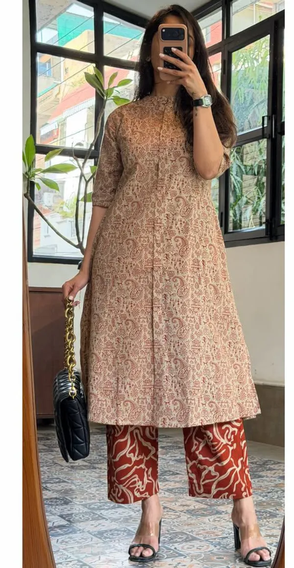 Warli_printed_A_line_buttoned_kurta_with_pocket_on_side_with_wide_palazzos