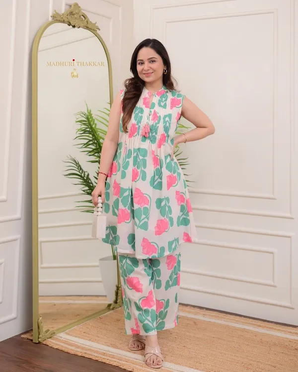nwind_in_style_with_out_relaxed_fitted_printed_kurta_set_in_pure_cotton_,_while_the_kurta_creates_an_effortless_chic_look_with_printex_and_tassel__detailing.