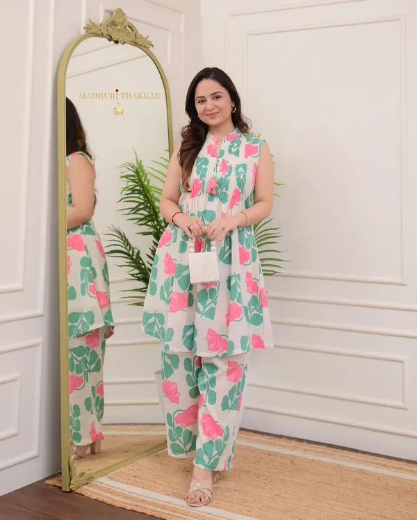 nwind_in_style_with_out_relaxed_fitted_printed_kurta_set_in_pure_cotton_,_while_the_kurta_creates_an_effortless_chic_look_with_printex_and_tassel__detailing.