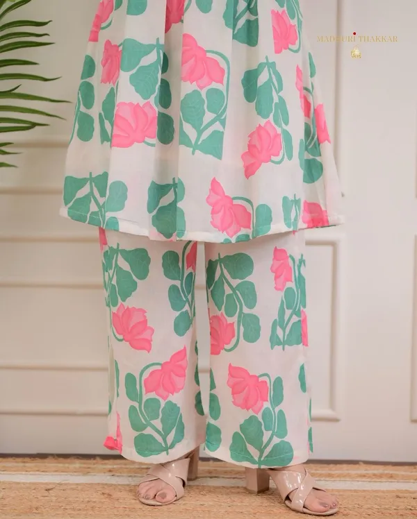nwind_in_style_with_out_relaxed_fitted_printed_kurta_set_in_pure_cotton_,_while_the_kurta_creates_an_effortless_chic_look_with_printex_and_tassel__detailing.