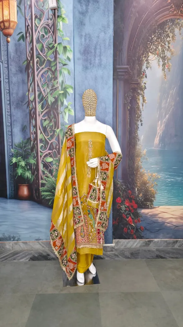 Mustard_Shimmer_Silk_Suit_With_Heritage_'Jharokha'_Embroidery_And_Potli_Bag_For_Women