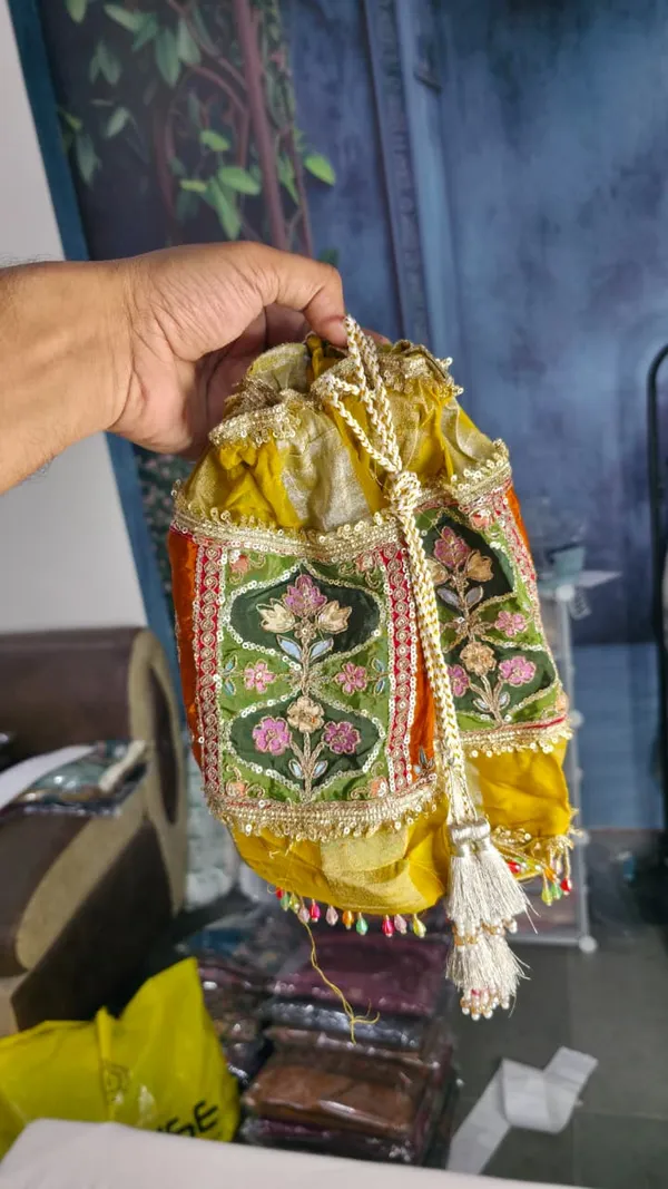 Mustard_Shimmer_Silk_Suit_With_Heritage_'Jharokha'_Embroidery_And_Potli_Bag_For_Women
