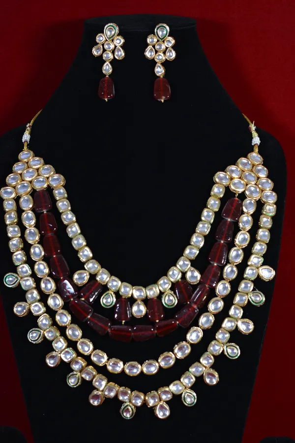 Red_And_Gold_Gold_Plated_Multi_Layer_Kundan_Necklace_And_Earrings_Set_(Pack_Of_3)