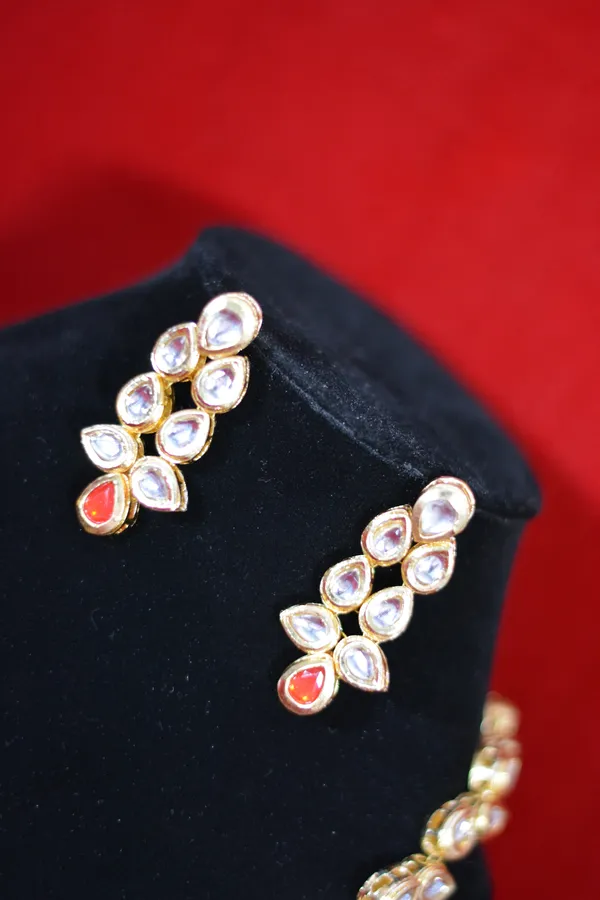Gold_Designer_Kundan_Necklace_Set_With_Red_Accent_Stone_(Pack_Of_3)