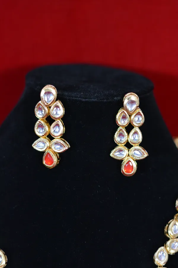 Gold_Designer_Kundan_Necklace_Set_With_Red_Accent_Stone_(Pack_Of_3)
