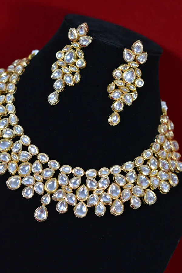 Gold_Handcrafted_Bridal_Kundan_Necklace_Set_With_Pear_Shaped_Stones_(Pack_Of_3)