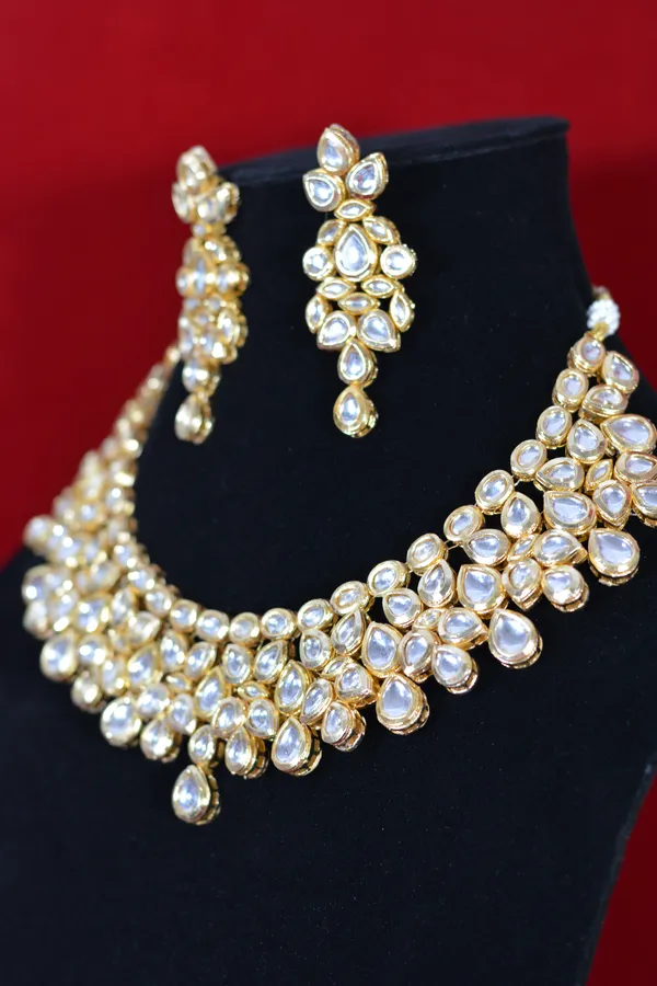Gold_Handcrafted_Bridal_Kundan_Necklace_Set_With_Pear_Shaped_Stones_(Pack_Of_3)