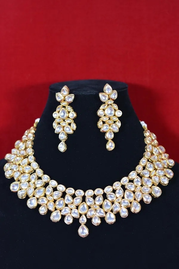 Gold_Handcrafted_Bridal_Kundan_Necklace_Set_With_Pear_Shaped_Stones_(Pack_Of_3)