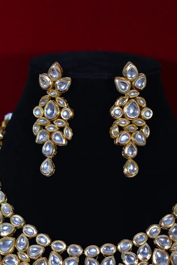 Gold_Handcrafted_Bridal_Kundan_Necklace_Set_With_Pear_Shaped_Stones_(Pack_Of_3)