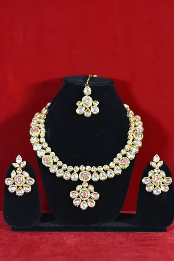 Gold_Kundan_Necklace_Set_With_Pink_Stone_Centerpieces_And_Earrings_(Pack_Of_4)