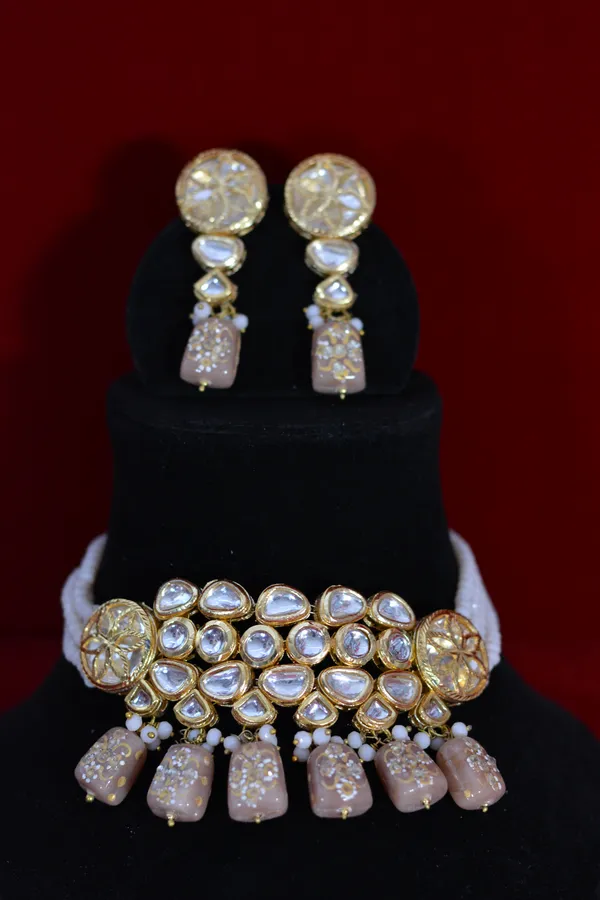 Handcrafted_Kundan_Choker_Set_With_Beige_Drops_And_Gold_Polish_(Pack_Of_3)