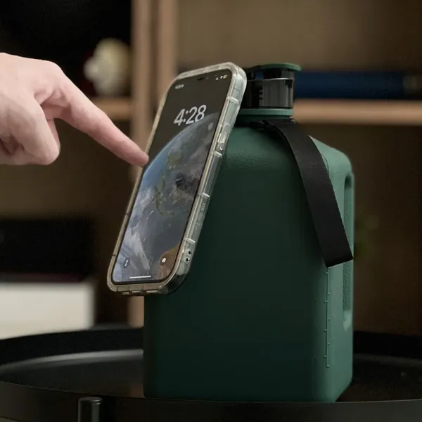 Black_Gym_Water_Bottle_With_Magnetic_Phone_Holder_–_2.7L_Bpa-Free_Sports_&_Fitness_2.7_Ml_Plastic_Bottle