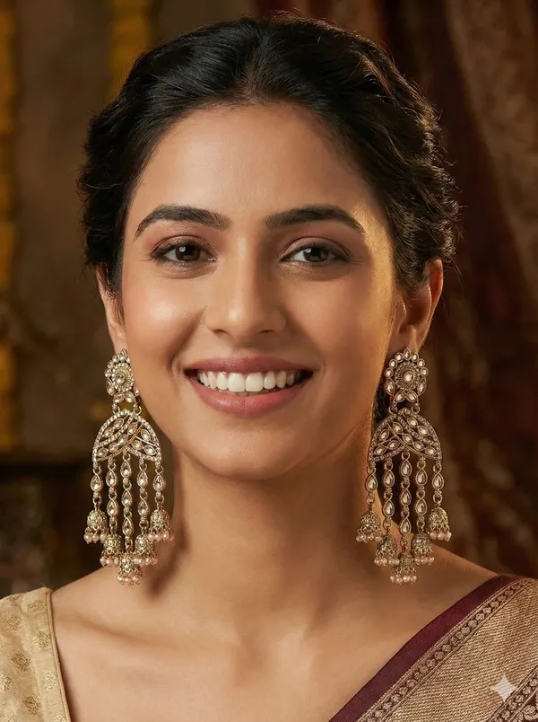 Gold-Toned_Kundan_&_Pearl_Studded_Crescent_Shaped_Jhumkas