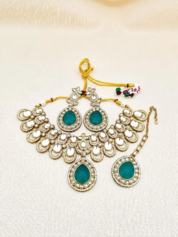 Gold_Plated_Big_Carving_Stone_Studded_Peacock_Green_Color_Jewellery_Set_For_Womens