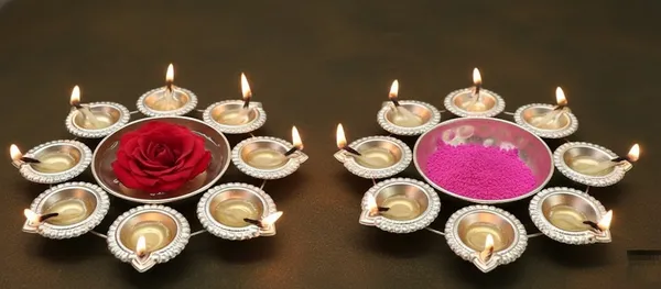 A_beautifully_Crafted_8_Diya_Metal_Urli_in_Gold_Color_Pack_of_2_Pc