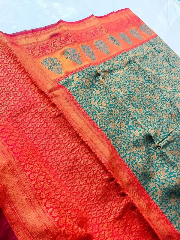 Dark_Green_Silk_Blend_Self_Design_Kanjivaram_Saree_For_Women