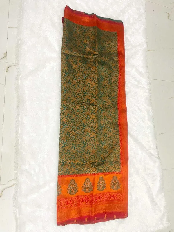 Dark_Green_Silk_Blend_Self_Design_Kanjivaram_Saree_For_Women