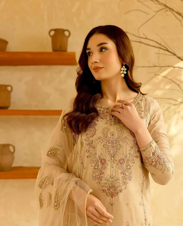 Noor-e-Zari_Handcrafted_Salwar:_"Noor"_(light)_perfectly_describes_the_way_the_embroidery_catches_the_glow_in_the_photo.