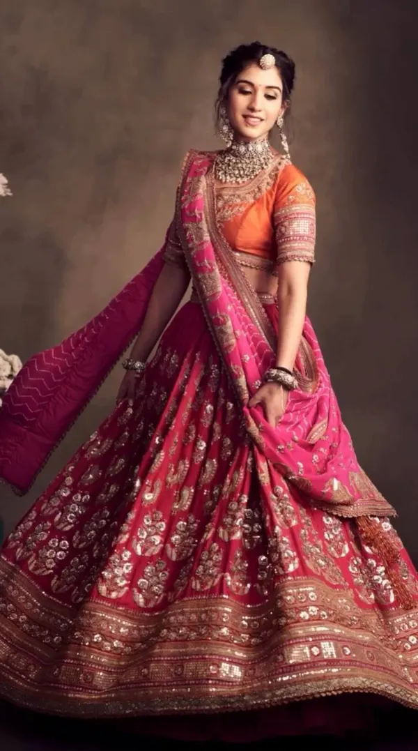 Zari-Encrusted_Rani_Pink_&_Saffron_Heritage_Lehenga_Set