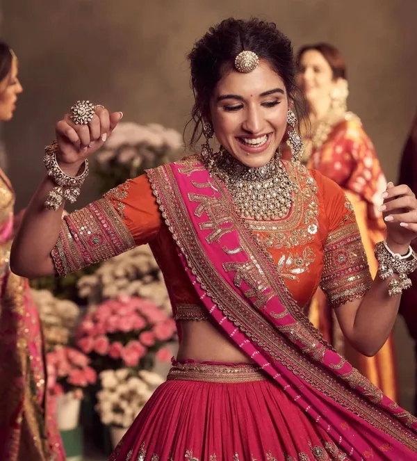 Zari-Encrusted_Rani_Pink_&_Saffron_Heritage_Lehenga_Set