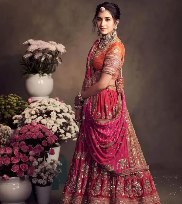 Zari-Encrusted_Rani_Pink_&_Saffron_Heritage_Lehenga_Set