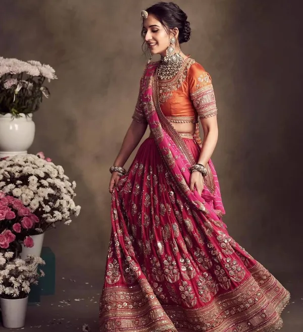 Zari-Encrusted_Rani_Pink_&_Saffron_Heritage_Lehenga_Set