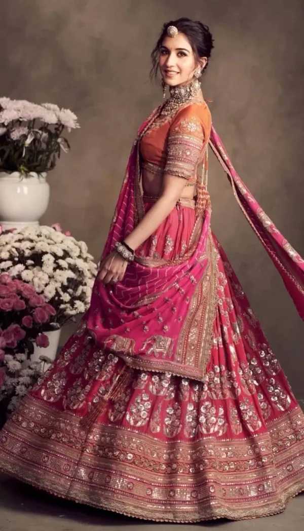Zari-Encrusted_Rani_Pink_&_Saffron_Heritage_Lehenga_Set