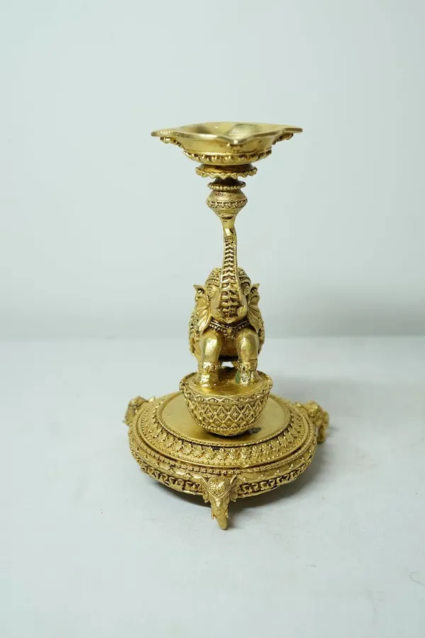 Rahadecor_Golden_Brass_Elephant_Diya_Stand_with_Peacock_-_Traditional_Dancing_Elephant_Oil_Lamp_-_14cm_Height_Weight-320grams