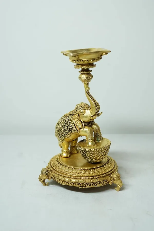Rahadecor_Golden_Brass_Elephant_Diya_Stand_with_Peacock_-_Traditional_Dancing_Elephant_Oil_Lamp_-_14cm_Height_Weight-320grams