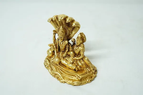 Rahadecor_Laxmi_Vishnu_Idol_God_Goddess_Statues_Religious_Deity_Resting_On_Sheshnaag_-_350g_H-10cm,_L-10cm