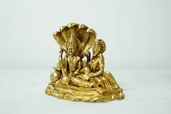 Rahadecor_Laxmi_Vishnu_Idol_God_Goddess_Statues_Religious_Deity_Resting_On_Sheshnaag_-_350g_H-10cm,_L-10cm