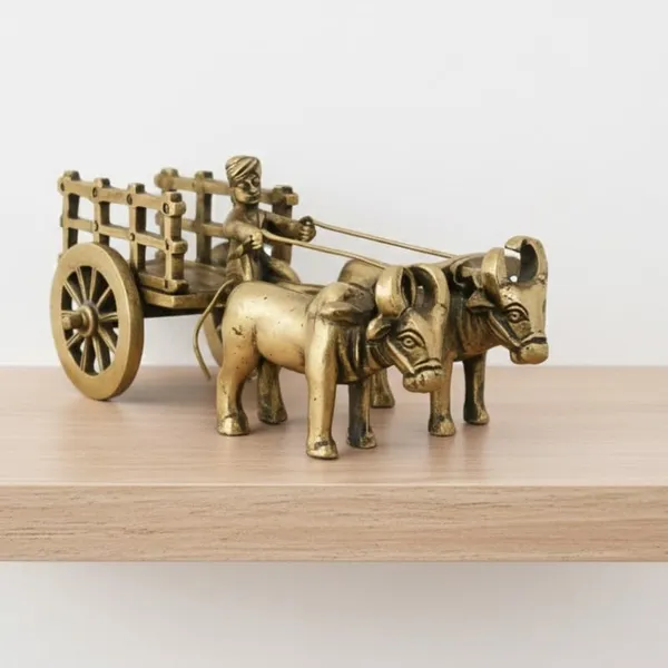 Golden_Brass_Vintage_Bell_Gaadi_Bullock_Cart_-_0.335_Kg_-_H_5_Cm,_L_12_Cm,_B_6_Cm_-_Cow_Bull_Rath_Decorative_Miniature_Showpiece_For_Table_Decor