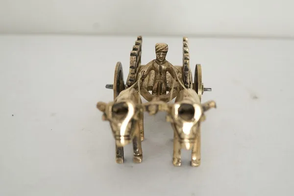 Golden_Brass_Vintage_Bell_Gaadi_Bullock_Cart_-_0.335_Kg_-_H_5_Cm,_L_12_Cm,_B_6_Cm_-_Cow_Bull_Rath_Decorative_Miniature_Showpiece_For_Table_Decor