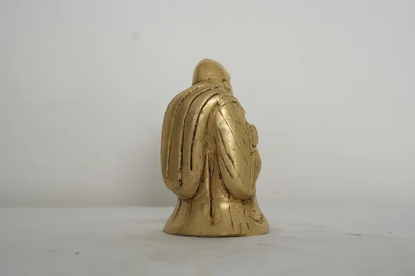 Golden_Feng_Shui_Laughing_Buddha_Brass_Statue_Happy_Man_-_0.515_Kg_-_H_9.3_Cm,_L_6_Cm,_B_5_Cm_-_Good_Luck_Wealth_Prosperity_Home_Office_Business_Gift