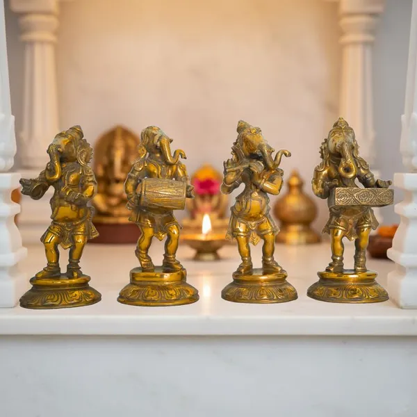 Golden_Premium_Brass_Musical_Ganesha_Set_6.765_Kg_-_H_20_Cm,_L_9_Cm,_B_7_Cm_-_Ganesh_Murti_With_Manjira_Murli_Dholak_Harmonium_Statue_For_Home_Temple_Decor_Gift