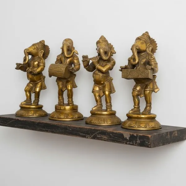 Golden_Premium_Brass_Musical_Ganesha_Set_6.765_Kg_-_H_20_Cm,_L_9_Cm,_B_7_Cm_-_Ganesh_Murti_With_Manjira_Murli_Dholak_Harmonium_Statue_For_Home_Temple_Decor_Gift