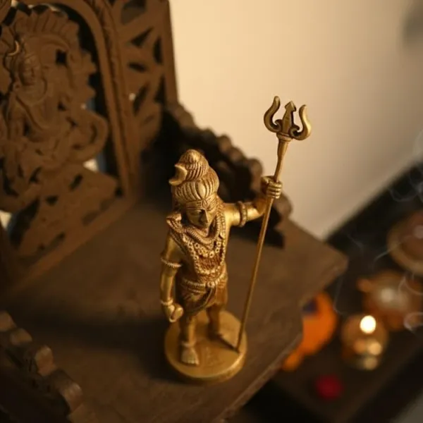 Golden_Brass_Bholenath_Lord_Shiva_Statue_-_0.765_Kg_-_H_17.2_Cm,_L_5.1_Cm,_B_5.1_Cm_-_Standing_With_Trishul_Mahakal_Murti_Mahadev_Figurines_Decorative_Showpiece