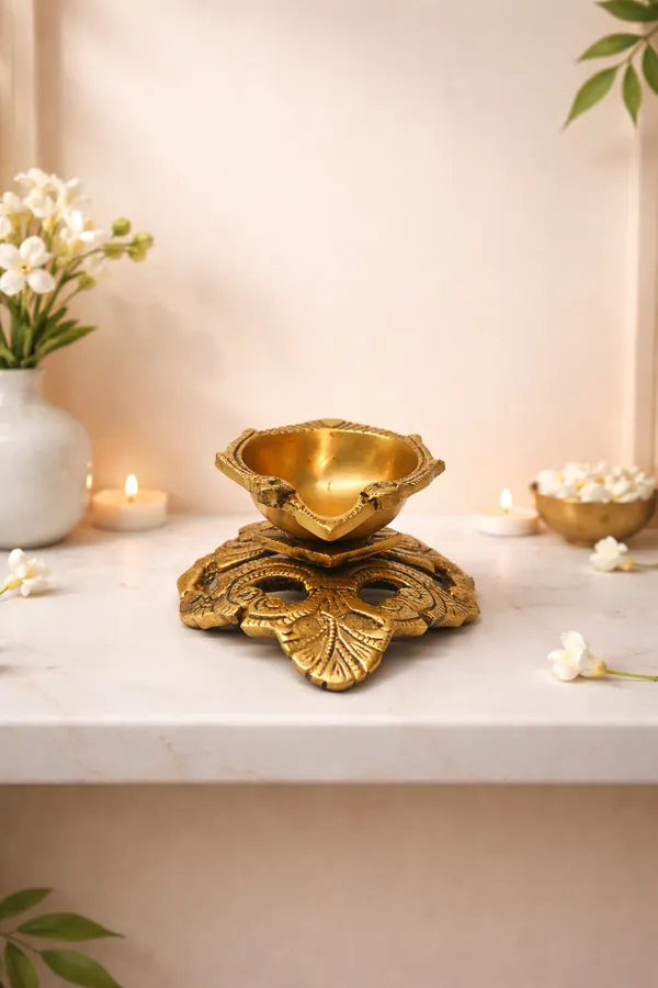 Brass_Diya_with_Royal_Floral_Carved_Base_||_Height:_5.5_cm,__Length:_12_cm,__Width:__12_cm_,_Weight:_430_g