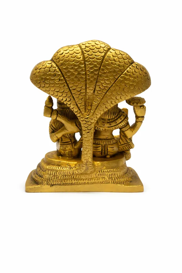 Brass_Vishnu–Lakshmi_Idol_Sitting_on_Sheshnag_||_Handcrafted_Hindu_God_Statue_for_Pooja_||_Height:_14cm,_Length:_12cm__Width:_5cm__Weight:_1.360kg