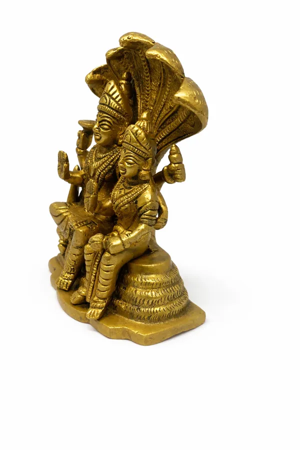 Brass_Vishnu–Lakshmi_Idol_Sitting_on_Sheshnag_||_Handcrafted_Hindu_God_Statue_for_Pooja_||_Height:_14cm,_Length:_12cm__Width:_5cm__Weight:_1.360kg