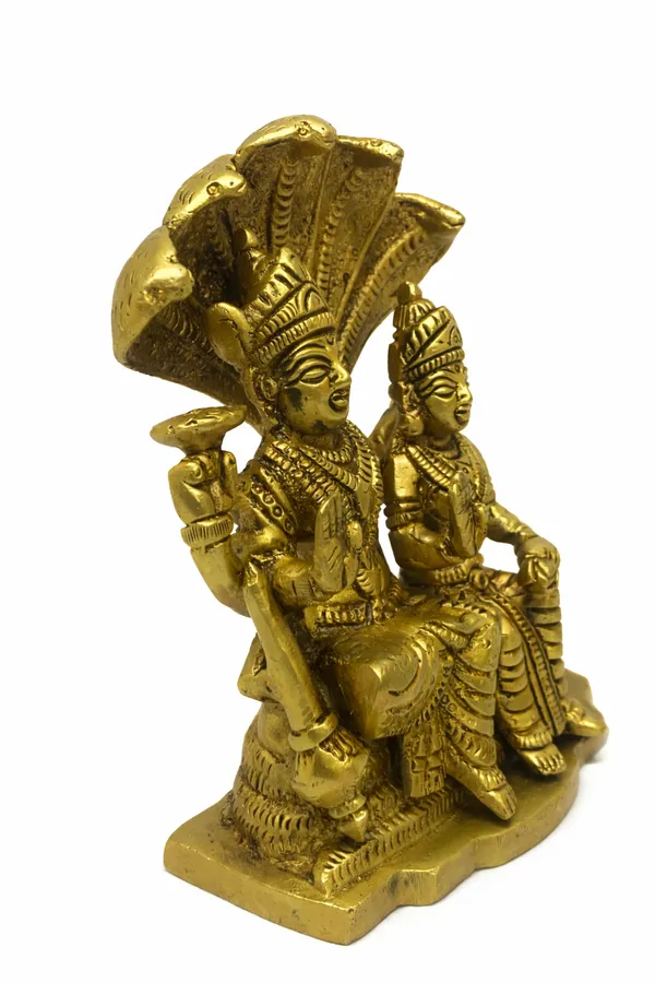 Brass_Vishnu–Lakshmi_Idol_Sitting_on_Sheshnag_||_Handcrafted_Hindu_God_Statue_for_Pooja_||_Height:_14cm,_Length:_12cm__Width:_5cm__Weight:_1.360kg