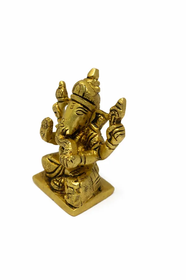 Divine_Brass_Lord_Ganesha_Idol_–_Seated_Blessing_Form_(8_cm)__Weight-290g