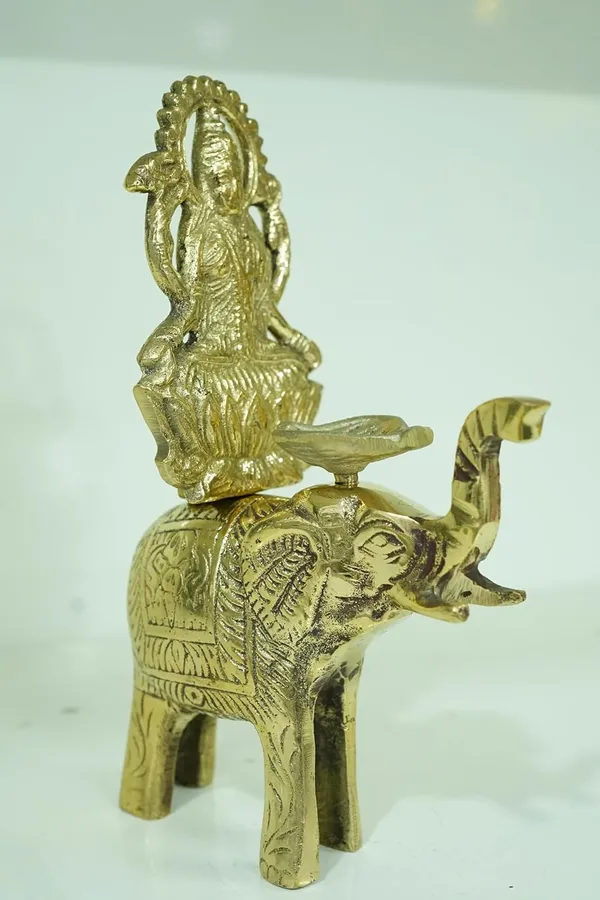 Golden_Brass_Mahalaxmi_On_Elephant_Idol_Lakshmi_Statue_For_Wealth,_Prosperity_&_Good_Luck_Hindu_Pooja_Mandir_Decor_For_Home,_Office,_Shop_&_Gifting